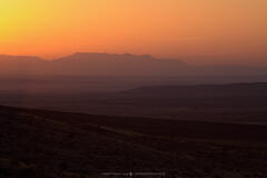2022030401, Hazy sunrise over the Marfa Plateau
