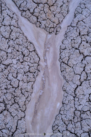 A dried mud flow among the cracked earth in the badlands of Big Bend National Park in West Texas.