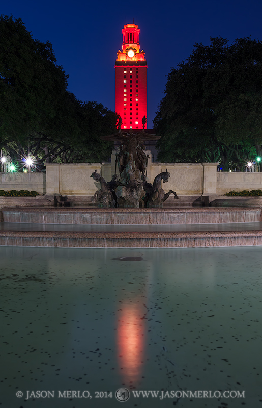 The Tower reflected in the Littlefield Fountain at the University of Texas in Austin, Texas.
