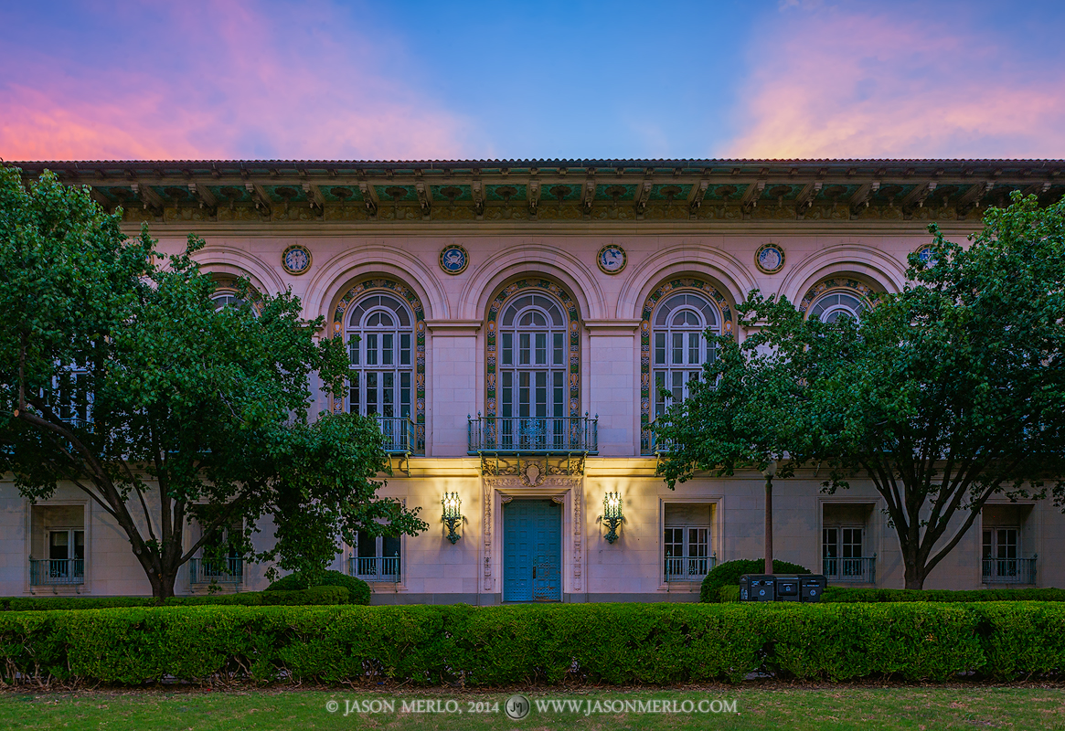 Battle Hall at dusk on the campus of the University of Texas in Austin, Texas.
