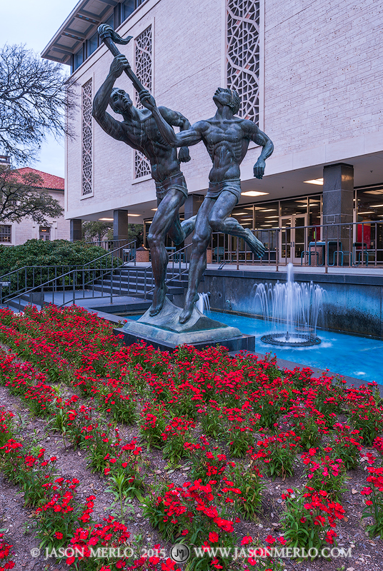 Flawn Academic Center and the Torchbearers statue at the University of Texas in Austin, Texas.