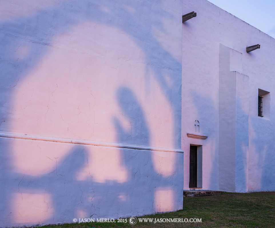 Shadows depicting the Nativity are projected onto a wall during Christmas&nbsp;at Mission Nuestra Señora del Espíritu Santo...