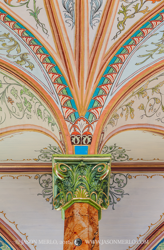 A column, capital, and painted arch at St. Mary Catholic Church in High Hill, one of the Painted Churches of Texas.