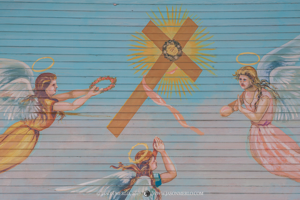 A painted mural of angels above the altar at St. Mary's Catholic Church in Praha, one of the Painted Churches of Texas.