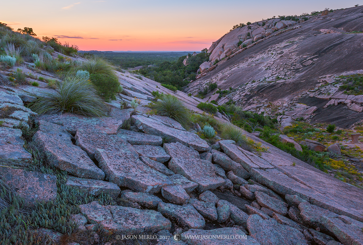 Slabs of granite that have exfoliated from the batholith at Enchanted Rock State Natural Area in Llano County in the Texas Hill...