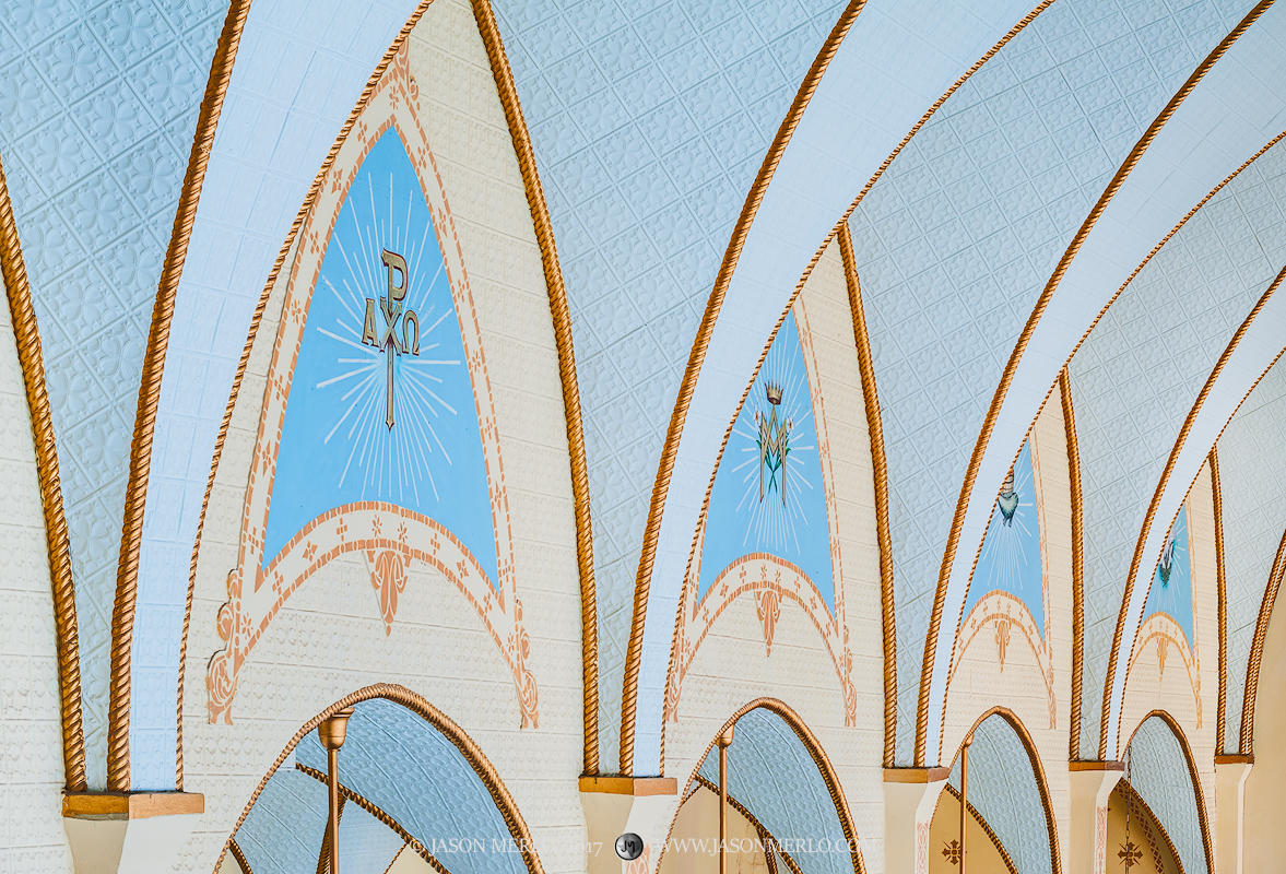 Painted arches at Our Lady of Grace Catholic Church in La Coste, one of the Painted Churches of Texas.