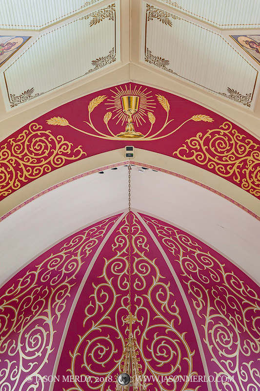 The painted apse and ceiling at Guardian Angel Catholic Church in Wallis, one of the Painted Churches of Texas.